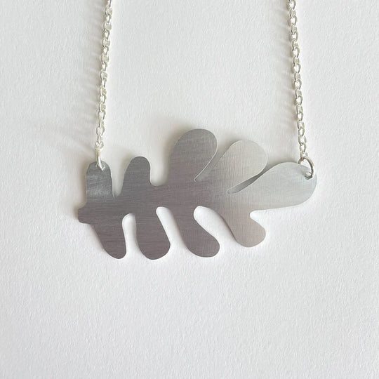 Brack Necklace in silver aluminium by Tom Pigeon