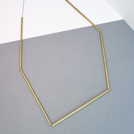 Scaffolding Asymmetric Pendant by Factory Floor Jewels