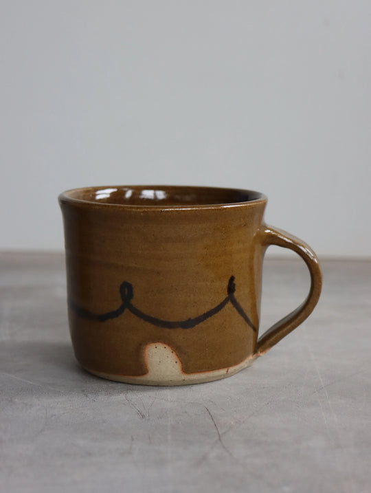 Coffee Cup in Umber by Hannah Burgess