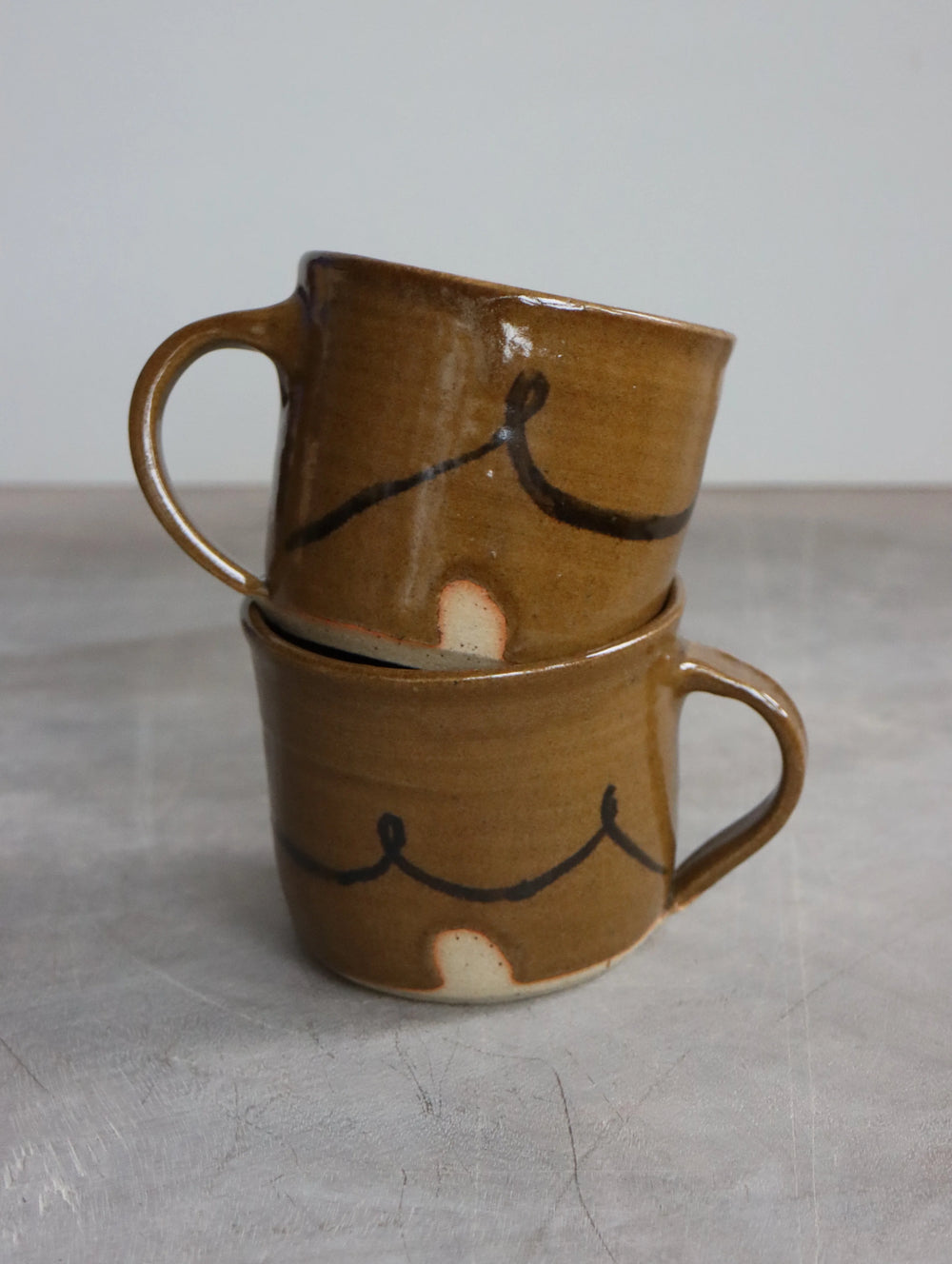 Coffee Cup in Umber by Hannah Burgess