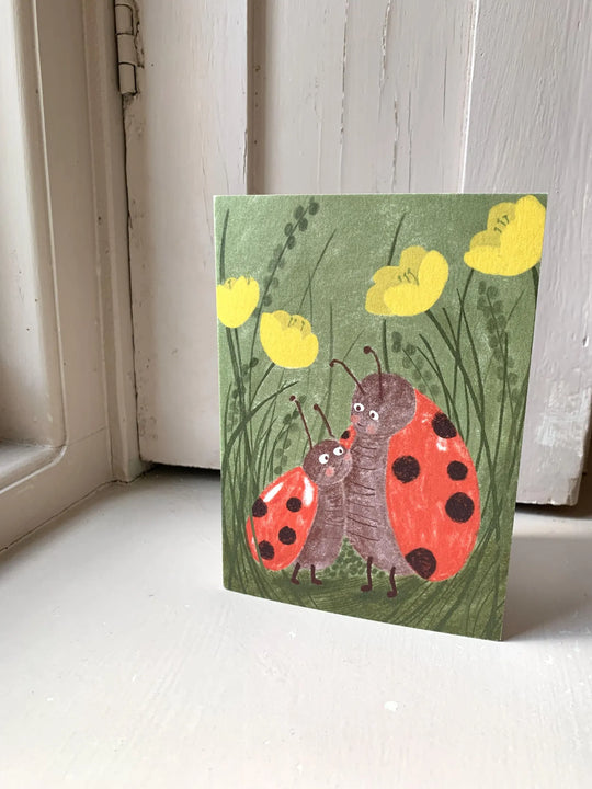 Ladybirds Greetings Card by Nicola Clarke