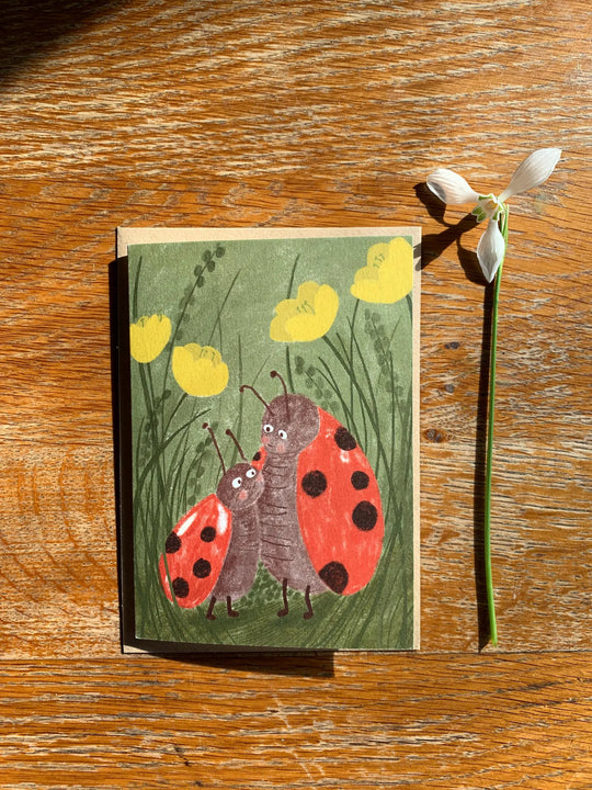 Ladybirds Greetings Card by Nicola Clarke