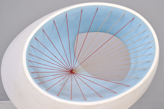 Barbara Hepworth, Sculpture with Colour (Oval Form) Pale Blue and Red, 1943, painted wood and strings.
